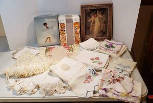 lot 227 image: Table Linens for Small Tables, Embroidered Napkins, Box of 5 Pair of Vintage Beauty Mist Silver Panty hose, and Framed Picture