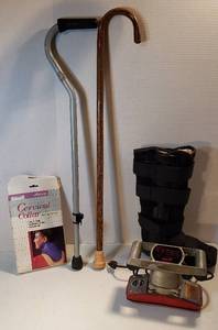 lot 229 image: 2 Canes, Cervical Collar, Walking Boot, Jeanie Rub Massager (works) and Pair of Alum. Crutches