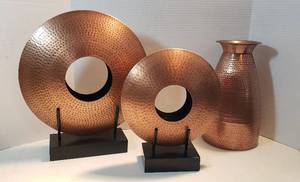 lot 237 image: 3 Pieces of Hammered Copper Decor Vase  13 in. tall and 2 Open Discs on stand by Global Views  11 in. & 15 in. diameter