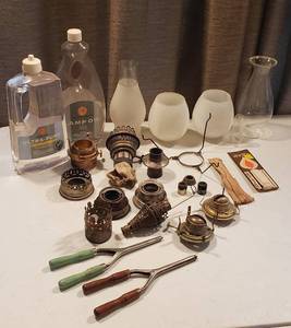 lot 287 image: Oil Lamp Parts Mantles, Wicks, Chimneys, Lamp Oil and 2 Vintage Hair Curling Irons