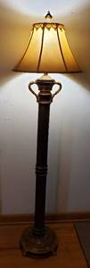 lot 312 image: Antiqued Brass Metal 3 way Floor Lamp  64 in. tall