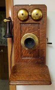 lot 318 image: Antique Western Electric Oak Wall Telephone  Model 317R  9 x 12 x 23 in. tall  chip on Mouthpiece