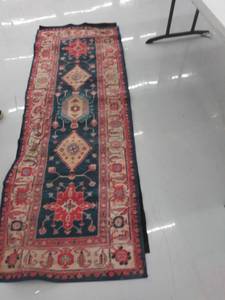 lot 27160 image: 84x29 runner rug with rug. mat- USED