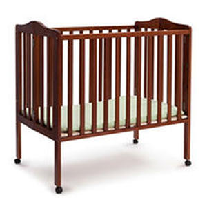 lot 27292 image: Delta Children Folding Portable Mini Crib with Mattress Cherry ( Not Inspected )