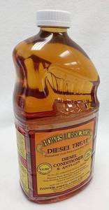 lot 215 image: Un-Opened Bottle - Howes Lubricants 103060 Diesel Fuel Additive - Amber, 64 oz. (half gallon)