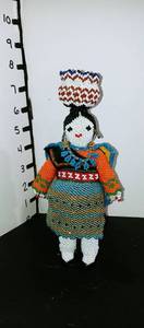 lot 1014 image: Hand beaded Native American gatherer statue