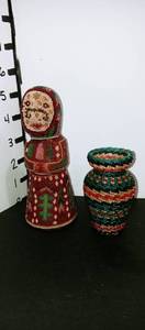 lot 1024 image: Hand beaded Native American woman and vase statues