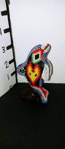 lot 1029 image: Hand beaded Native American dolphin statue