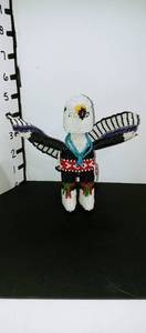 lot 1035 image: Hand beaded Native American dancing eagle statue