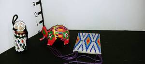 lot 1036 image: Josue Ortocha Tilcajete hand painted armadillo with beaded figurines