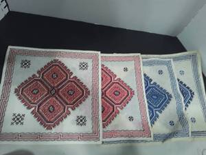 lot 1043 image: 4 Crosstiched Doilies. Blue ones are slightly dirty