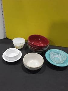 lot 1106 image: 9 pc. Miscellaneous bowls. 1 Fiesta ware and 2 Fire King the rest are miscellaneous