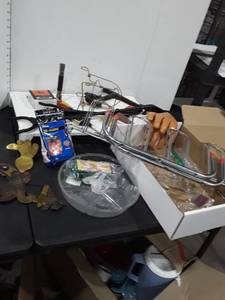 lot 1517 image: Miscellaneous household items Wire connectors, paint brush, shoe rack, grabbers, floral clay, and other items