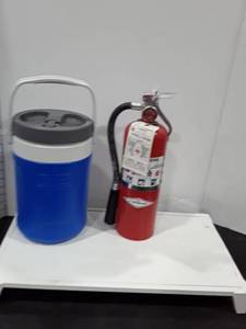 lot 1527 image: Coleman water jug and a fire extinguisher