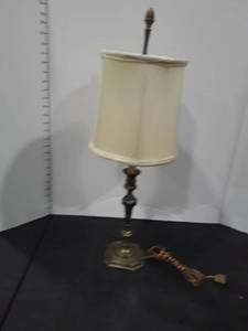 lot 1534 image: Another brass table lamp. The shade is torn on inside