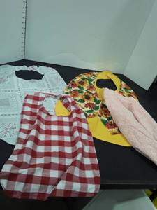 lot 1546 image: 3 adult bibs and a cape cover