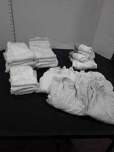 lot 1562 image: Lot of mens whitie tidies and under shirts. Mostly sized 36 - 38. 4 pair jockey are size 32