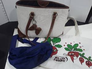 lot 1571 image: 3 bags. One is a fanny pack and the large white one is a Coldwater Creek bag
