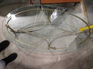 lot 2010 image: Brass bottom oval shaped coffee table 15 x 51 1 12 with beveled oval shaped glass top