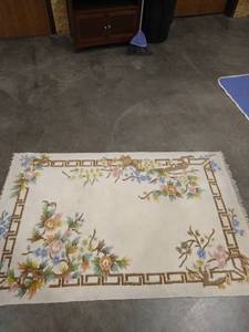 lot 2019 image: Blue, green, yellow, orange. brown, pink rectangle area rug 69 x 43 in.
