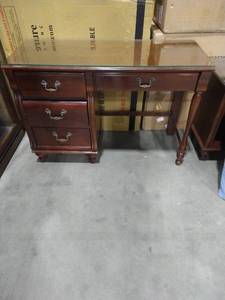 lot 2022 image: Young America brand 4 drawer wooden writing desk 30 14 x 44 18 x 18 14 in. with glass top 44 x 17 34 in.