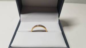 lot 5214 image: 10K White and Yellow Gold 14ct TDW White Diamond Channel Band- Retail$162.99