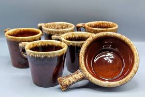 lot 1499 image: (7) Piece Lot Hull Oven Proof Pottery, Brown Drip (6) Mugs and (1) Handled Soup Bowl