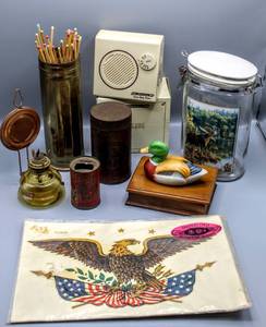 lot 1522 image: (8) Piece Variety Lot - Americana Solid State Radio wbox, Elk Jar, Calumet Baking Powder VintageAntique Tins, American Eagle 1104-A 59c Meyercord Decal 8.513.5 ,Oil Lamp and more