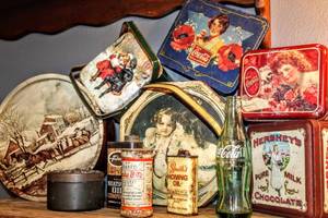 lot 1523 image: (11) Piece Vintage Antique Product Tins - Coke Bottle and Coca Cola Memorabilia, Metzke Pewter Noahs Ark Tin, Hersheys, Currier & Ives, Sunshine Biscuits, Snake Bite Outfit ...