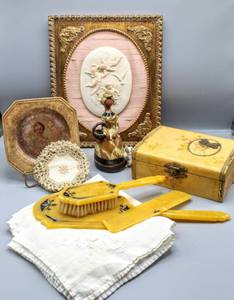 lot 1000 image: Vintage 1950s Bakelite Womens Vanity Set (3) Pcs, Vintage Handkerchiefs (6), Jewelry Box, (6) Crochet Doilies, Cherub Framed Bisque, UCTCI Japan Woman with Basket and Dog Figurine Pottery
