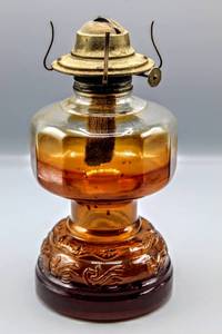 lot 1537 image: Amber Glass Kerosene Lamp and Jar, Ornate Candle Holder and Antique Snapshots