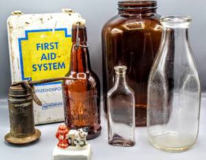 lot 1541 image: Vintage Variety - P Lewis Long Spout Oil Can, First Aid System (wsupplies inside),Vtg Grolsch, Milk, and Medication with Stopper Bottles, Vtg Japanese Dog Peeing on a Hydrant Figurine Dish Ashtray