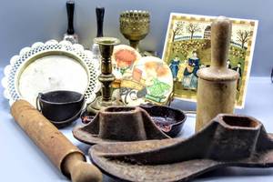 lot 1552 image: Variety of VintageAntique TreasuresCarol Endres Love One Another Folk Art Tile Antique Shoe Forms AntiqueVintage Kitchen Rolling PinMalletsChurn Miniature Cast Iron Pan & Pot Kettle Silverplate Tray Bells, Candlesticks, and more