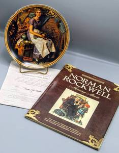 lot 1546 image: Norman Rockwell Dreaming in the Attic Collector Plate w COA in Original Box & The Saturday Evening Post Norman Rockwell Memory Album
