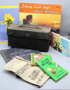 lot 1561 image: Wide Variety of collectibles in this lot -  Stamp Album, Peanuts Books, 8 Tracks & LP Album, Music Memorabilia