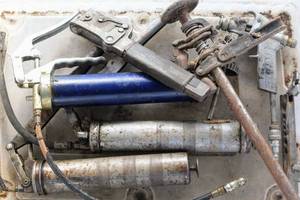 lot 2263 image: Grease Guns, Power Boxes, Pneumatic Sander with Roll of Sand Papers, Nitto Baby Duster, Airway Roller, Antique Hand Drill and more