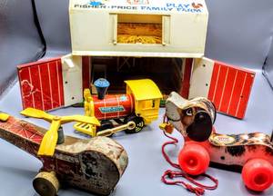 lot 1686 image: Vintage Toys Lot, Fisher Price Family Farm 915, Toot Toot 643,  Little Snoopy, Fisher Price Doll, Walt Disney and Ideal