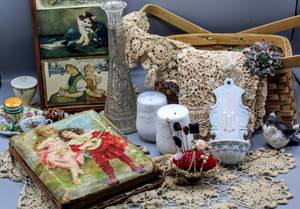 lot 1693 image: Vintage Doilies, BATTANI Victorian Cast Metal Gold Toned Rhinestone Basket Sewing Pin Cushion, Meiko China Trinket Dish, Antique Family Photo Album, Vintage Cards Framed Art