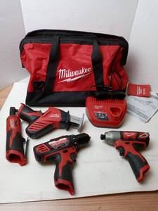 lot 33 image: Milwaukee Tool kit 5 piece set including Cordless Hackzall Reciprocating Saw, 38 Hammer DrillDriver -NO BATTERIES INCLUDED