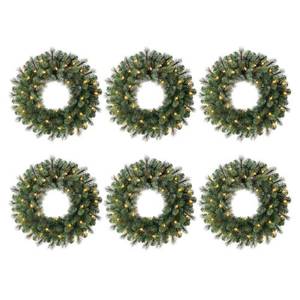 lot 71 image: Home Accents Holiday 24 in. Battery Operated Pre-lit LED Artificial Wesley Long Needle Pine Christmas Wreath w 30 Warm White Lights (6-Pack)