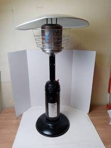 lot 262 image: Legacy Heating 11,000 BTU Mocha Table Top Gas Patio Heater used