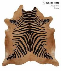 lot 18820 image: Zebra Print on Camel Color Natural Cowhide Rug 5x8 Retail $329