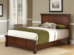 lot 2575 image: The Aspen Rustic Cherry Queen Bed by Home Styles. FOOTBOARD ONLY.