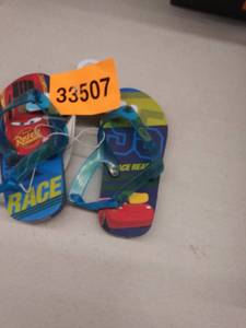 lot 33507 image: 78 cars flip flops