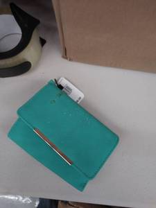 lot 29733 image: wallet-has spot on it