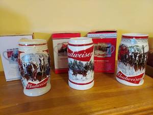 lot 7314 image: (3) Budweiser Holiday Steins - 2015, 2016, 2017