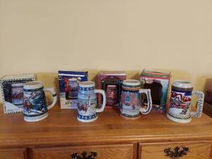 lot 7318 image: (4) Budweiser Holiday Steins - Boxes are Damaged