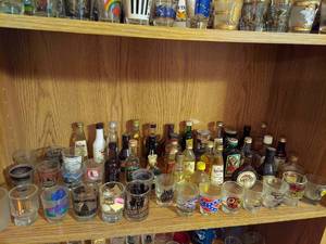 lot 7351 image: Shot Glasses and Small Bottles on Shelf - Bring Boxes