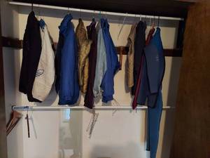 lot 7401 image: All Coats Remaining in Closet