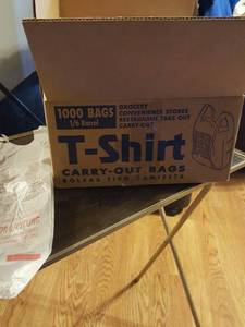lot 7230 image: T-Shirt bag, box is very near. full